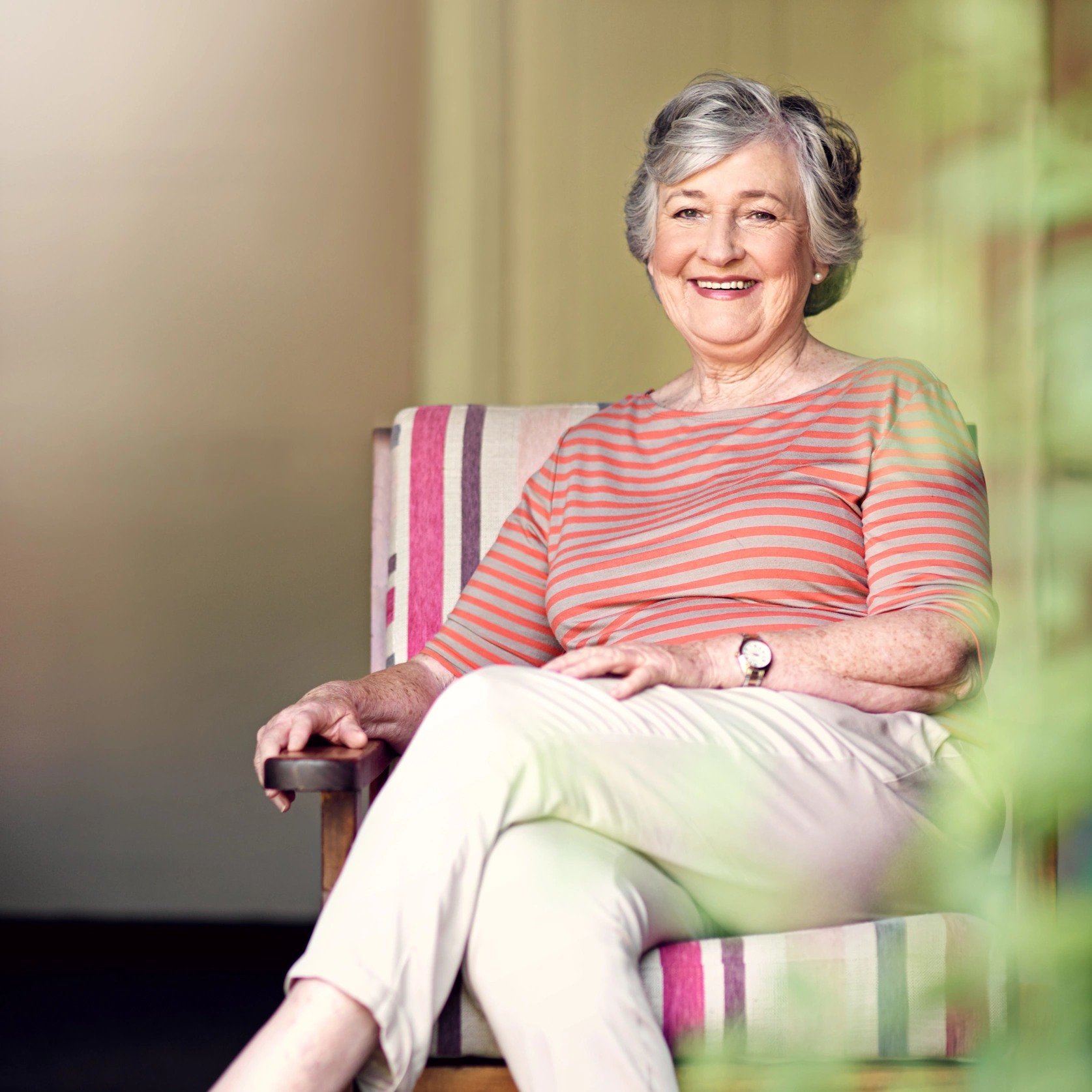 Elder Home Care Plano, TX Elderly woman smiling sitting in chair
