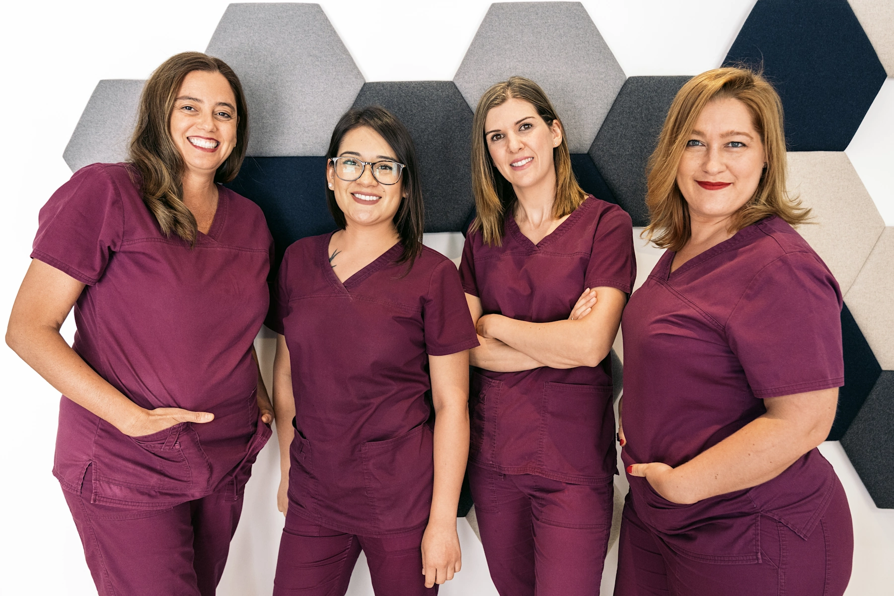 Nurse Staffing Plano TX a crew of nurses pose happily side by side